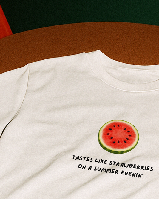 "Tastes like strawberry" Baby Tee